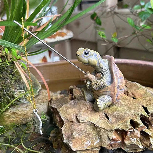 Figurine de tortue qui pêche - Tresors de Deco